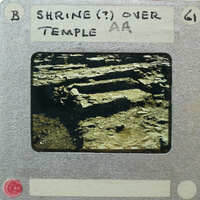 Old film strip with a photograph of an ancient temple steps.