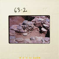 Ancient rock formation on a rocky surface.