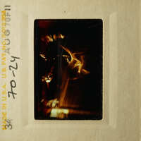 A black and white photograph of an object with a blurry background.