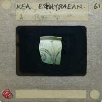 Vase fragment with intricate designs.