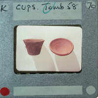 Image of two clay cups with a label and an X-ray film border.