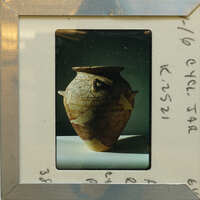 Multi handled reassembled jar (K.2521) with spiral and other decorations.