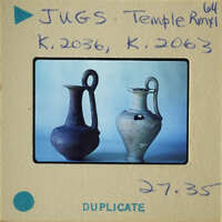 Two ancient vases on display.