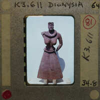 A photograph of an terracotta clay figurine on display K3.611