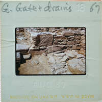 A photograph of a stone structure with a label and date indicating it was taken on August 18, 1967.