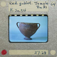 Reassembled red goblet with two handles in profile, K.2034.