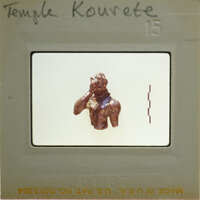 Small figurine of a person on a film strip.