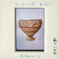 Ancient Greek style pottery with swirling patterns.