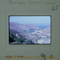 A vintage photograph of a coastal landscape with mountains and a body of water, labeled "Poseidna General View" on the film strip.
