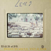 Two vintage photos showing construction work on a building with workers and equipment, set against an outdoor background.