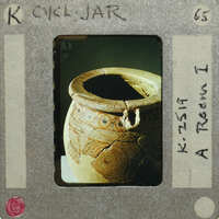 Detail of multi handled reassembled jar (K.2521) with spiral and other decorations.