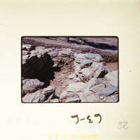 Old stone ruins with sunlight and shadows.