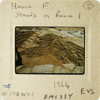 Old photograph of stone stairs with handwritten notes on an envelope.