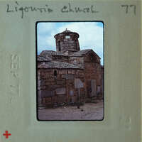 Old stone church with a bell tower, taken on September 17, 1977.