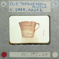 Profile photograph of a cup (K.2088) with a ripple design.