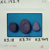 Three purple rocks on a blue background with labels and numbers.