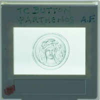 A coin with a profile of a person on it, viewed through an X-ray machine.