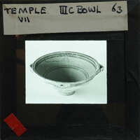 Reassembled decorated bowl on display showing interior.