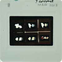 A slide with images of frescoes.