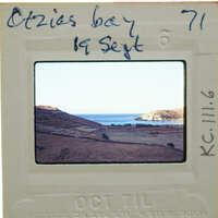 Picture of a landscape with water and hills, taken on September 19th, labeled as "Otzios Bay" with the number 71.