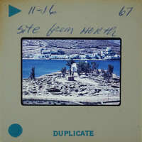 Picture of a coastal village with an old photo label.