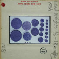 Circular metal objects, possibly weights.