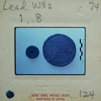 Two blue circular objects on a white background with black writing and numbers.