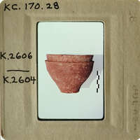 Red clay pot on white background.