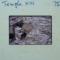 Stone walls and with doorway and floor.