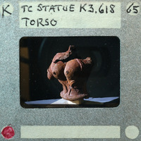 Terracotta figurine fragment of female torso 3/4 view K3.618.