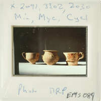 Three ancient Greek vases on display.