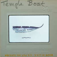 Small metal fragment of what looks to be the hull of a boat.