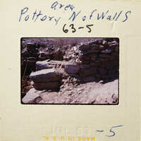 Old stone ruins with visible mortar and bricks.