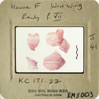 Photograph of ancient pottery shards on display.