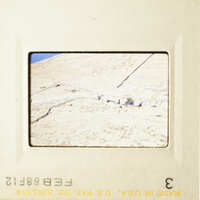 Two photos depicting scenic landscapes, one with a body of water and the other with a rocky terrain.