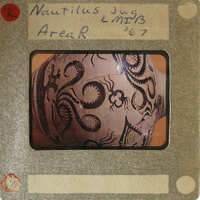 Ancient vase with intricate designs on a museum card.