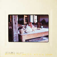 A pottery workshop with various items on display.