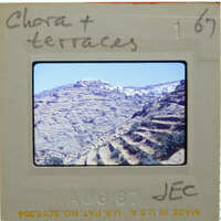 A slide of a mountainous landscape with terraces.