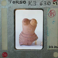 Terracotta figurine fragment of female torso from front, K3.630.